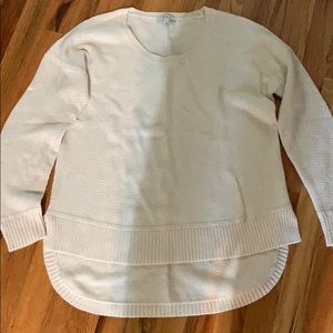 Made we all cream colored sweater. Medium.